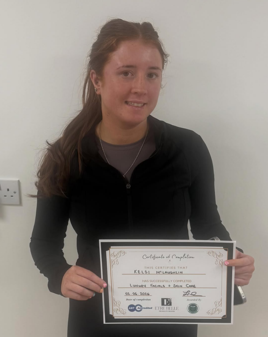 Kelsi McLaughlin with her Luxury Facials & Skin Care certificate